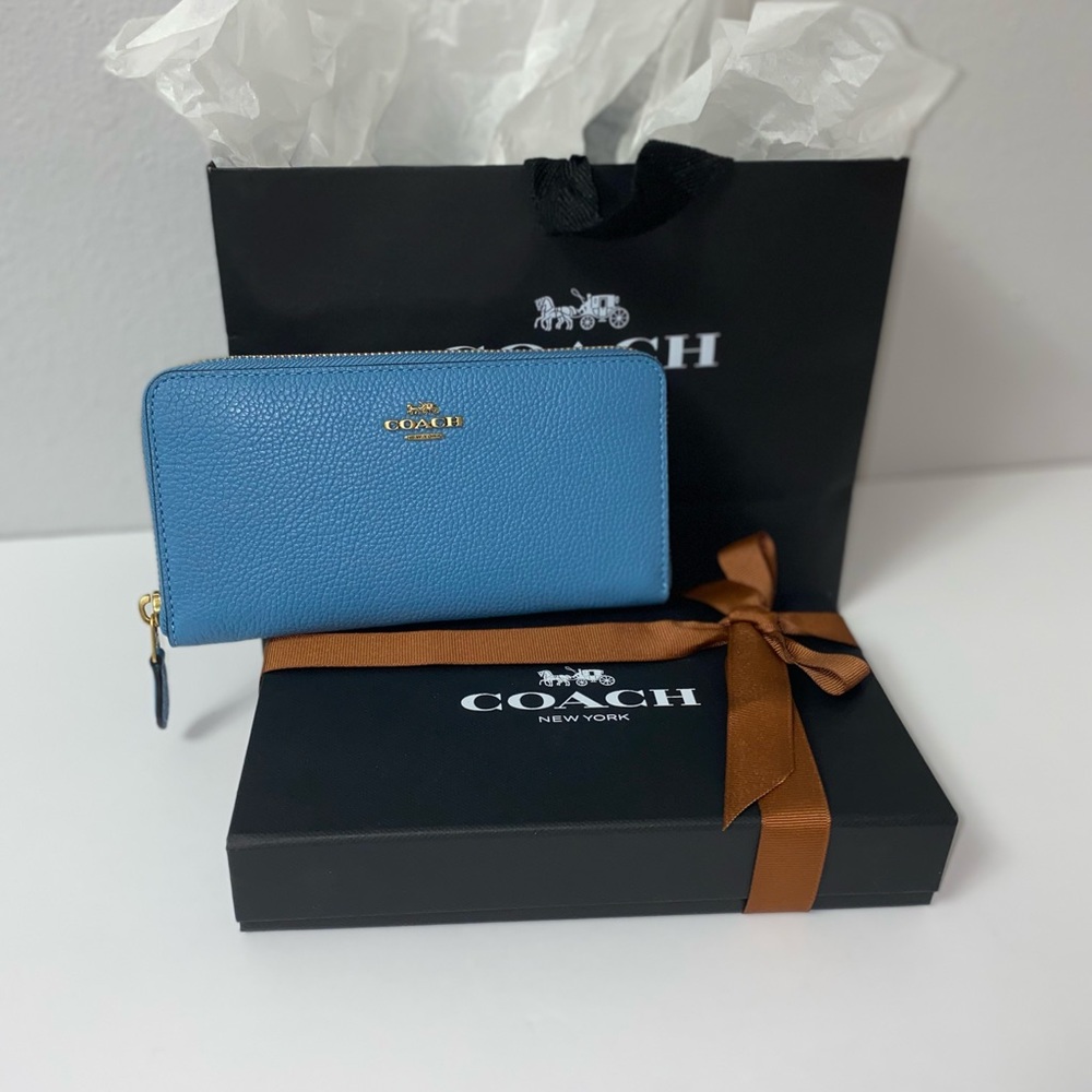 Pacific Blue Coach leather wallet.